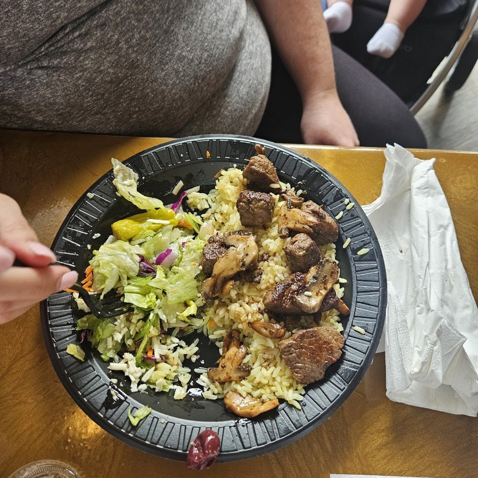 Menu page showing combination plates and sides.